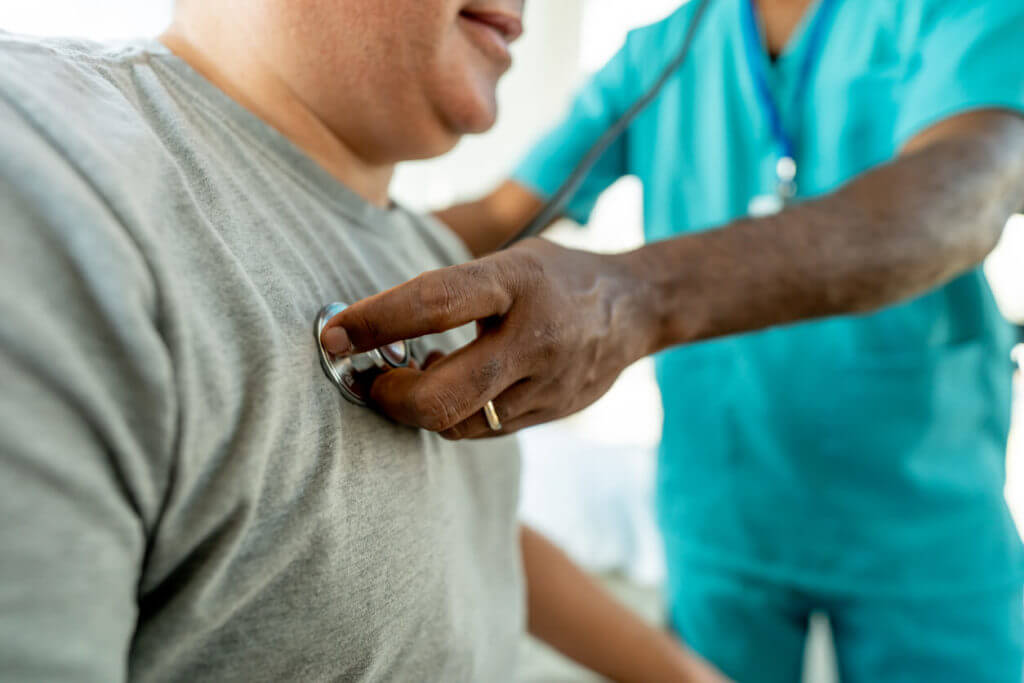 Inetrnal Medicine Doctor doing screening of a patient