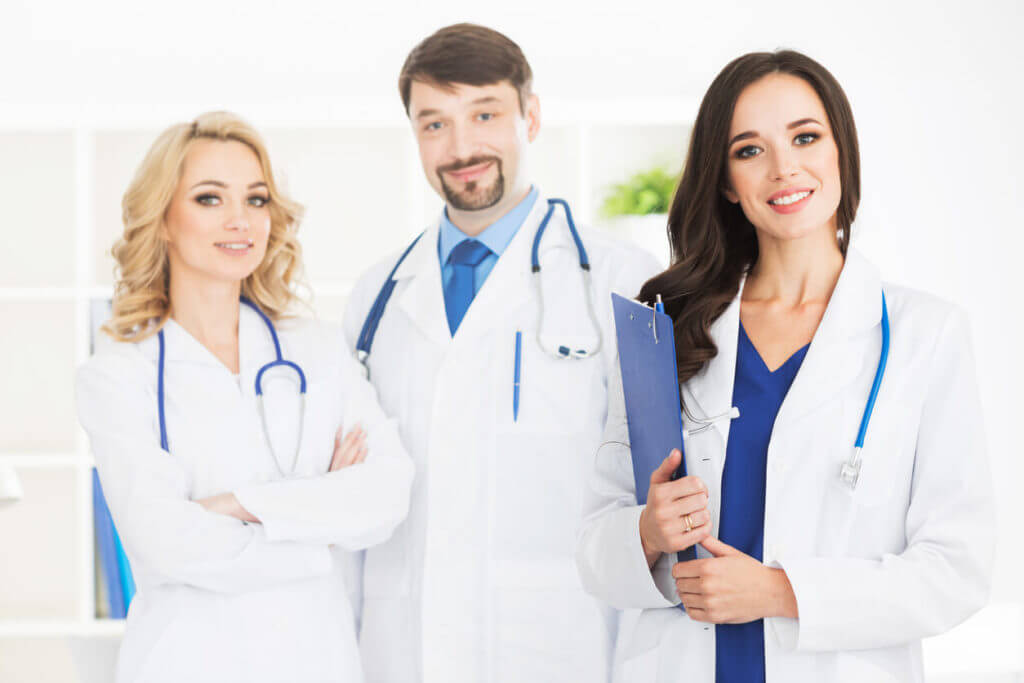 A team of internal medicine physicians standing together.