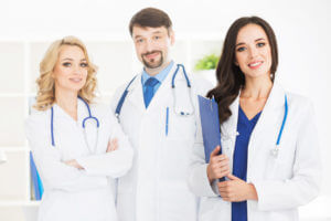 A team of internal medicine physicians standing together.